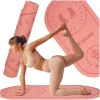 Mata fitness do ćwiczeń jogi wygłuszająca antypoślizgowa 125x61,5x0,6 cm różowa - zdjęcie