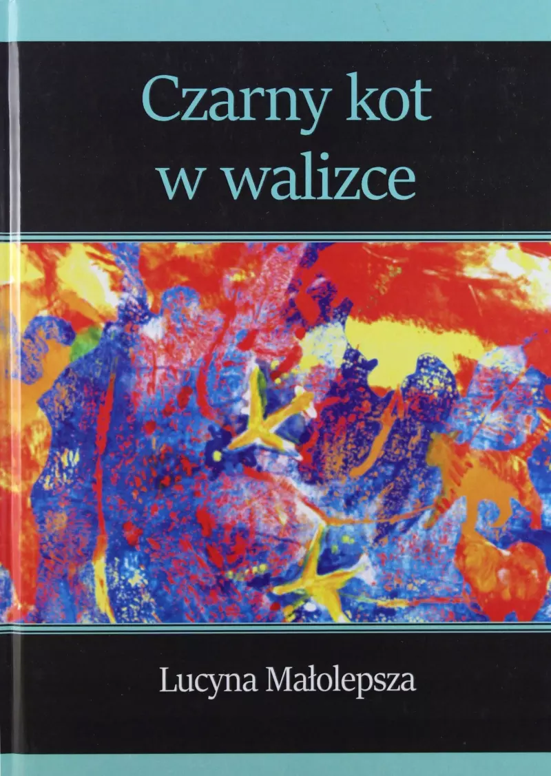 Czarny kot w walizce