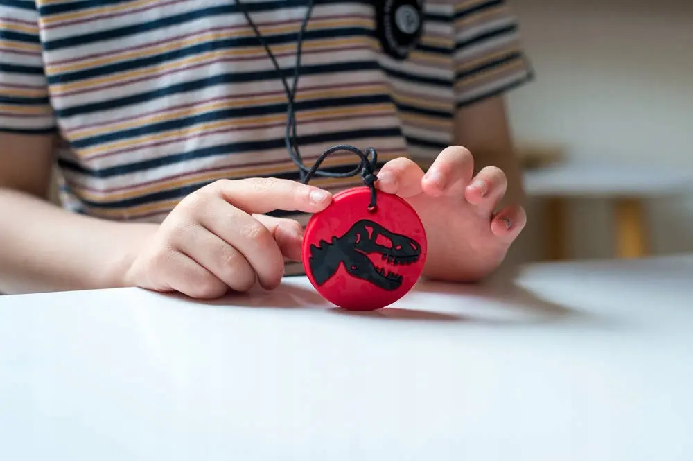 Gryzak terapeutyczny, dinozaur, fioletowy, Jellystone Designs - Mama i dziecko